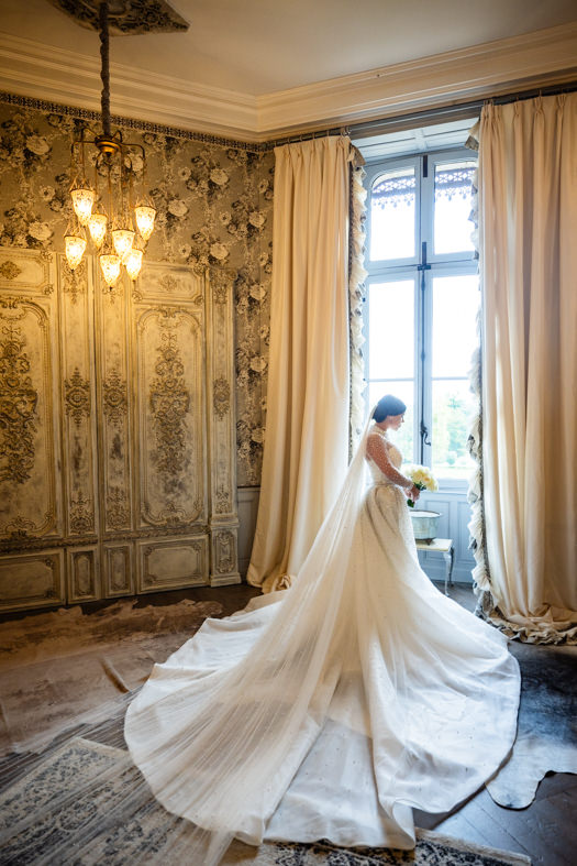beautiful bride with wedding dress chateau challain
