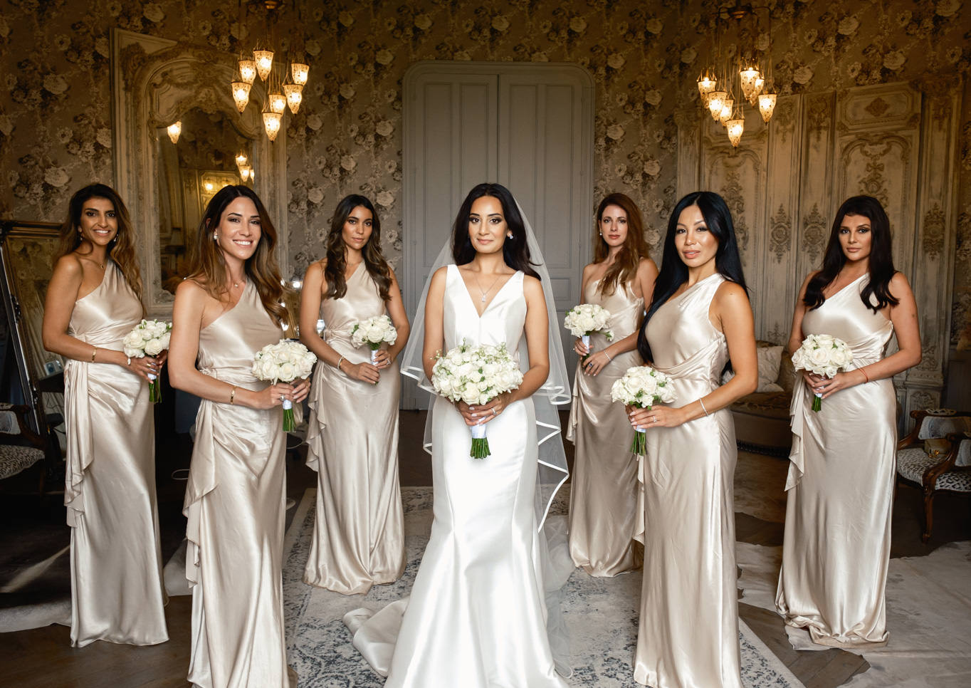 bride with bridesmaids chateau challain